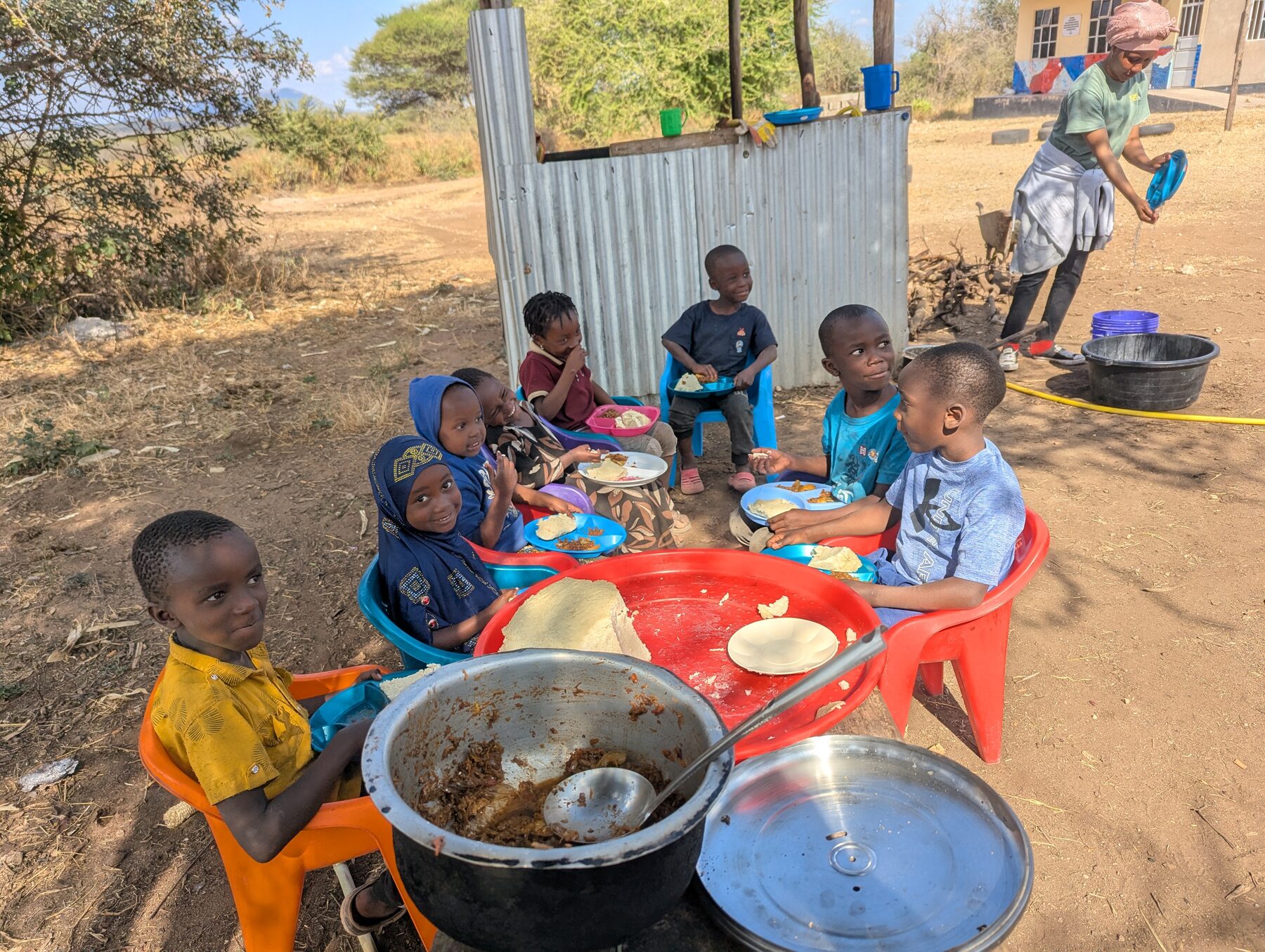 Children sharing a meal at school